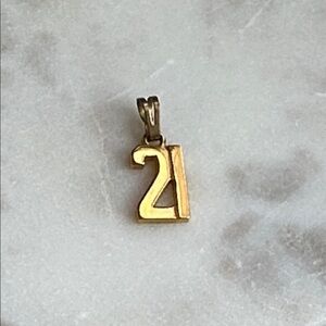 Vintage Monet EUC goldtone 21 pendant. Drop measures appx. 11/16”; 6/16” width